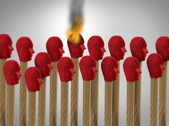 Matches with red heads which have the shape of a human head. One of them burns.